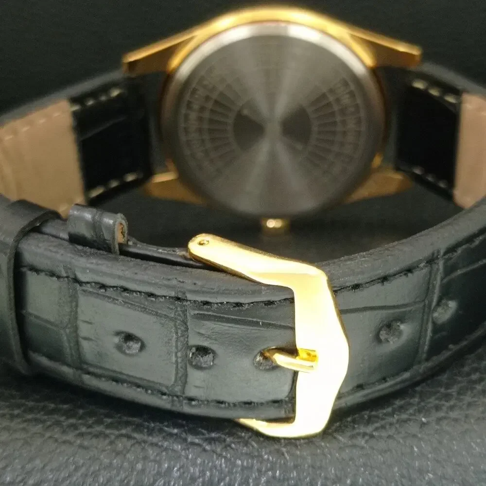 Vintage 1973 Roulette Manual Mens Gold Watch W/Leather Strap & Yellow accents